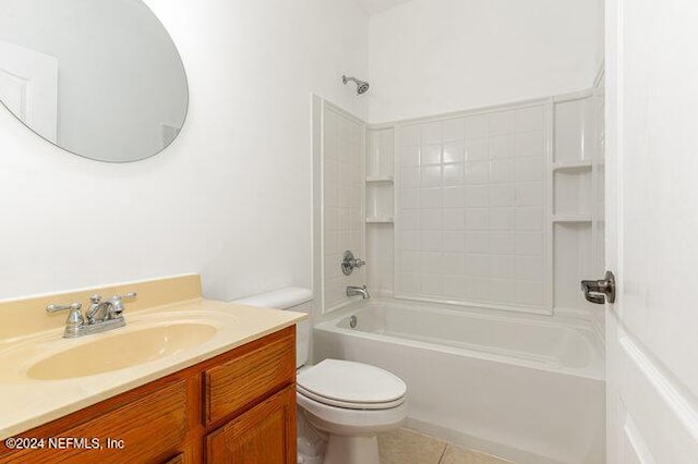 full bathroom with tile patterned floors, bathing tub / shower combination, vanity, and toilet