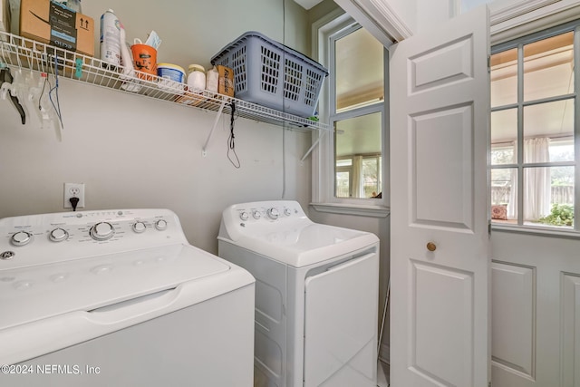 laundry room with independent washer and dryer