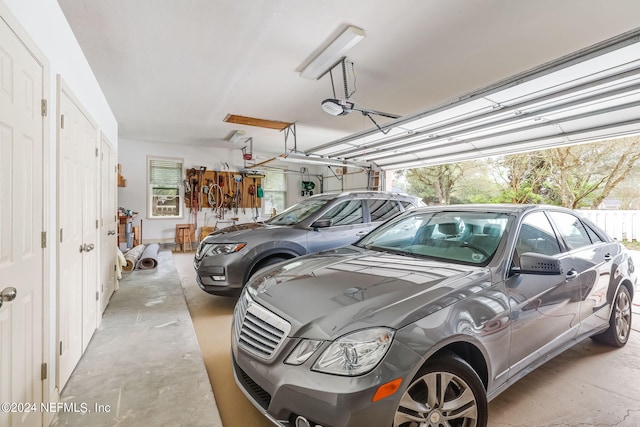 garage featuring a garage door opener