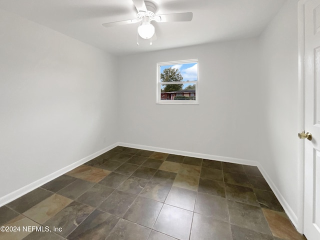 empty room featuring ceiling fan