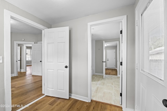 hall featuring hardwood / wood-style floors