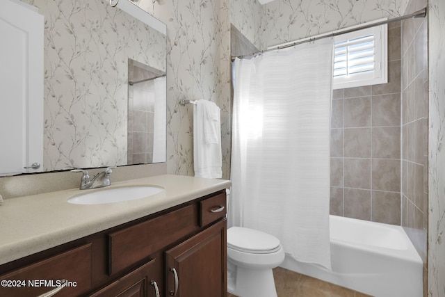 full bathroom with shower / tub combo, vanity, and toilet