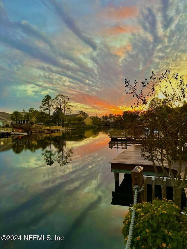 view of dock with a water view