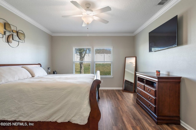 bedroom with ornamental molding, a textured ceiling, ceiling fan, and dark wood-type flooring