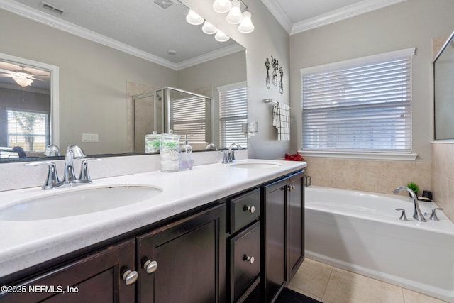 bathroom featuring ceiling fan, plus walk in shower, tile patterned flooring, vanity, and ornamental molding