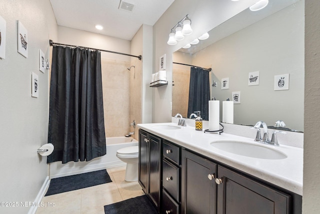 full bathroom with tile patterned floors, shower / bath combination with curtain, toilet, and vanity