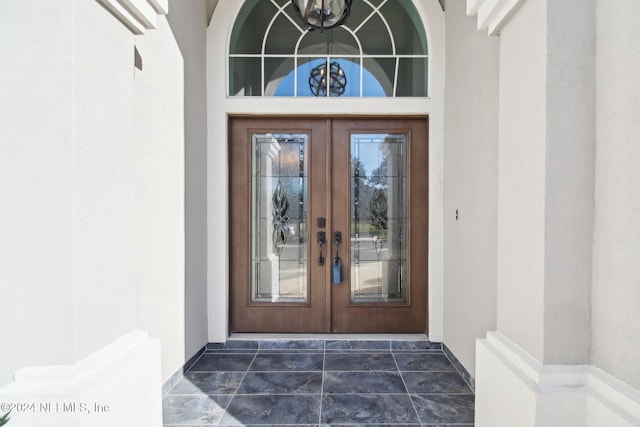 view of exterior entry with french doors