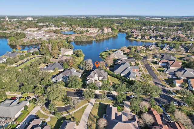 bird's eye view with a water view