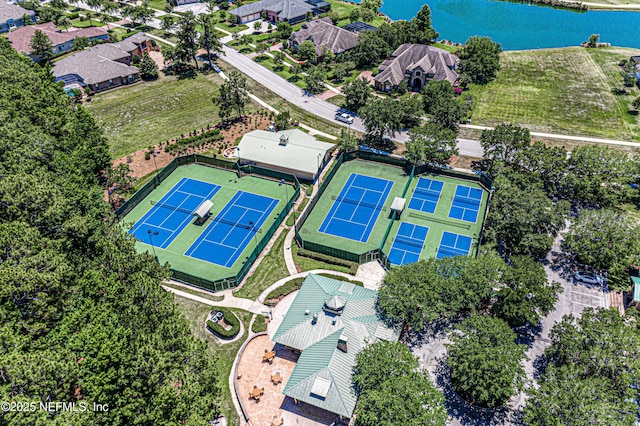 birds eye view of property featuring a water view