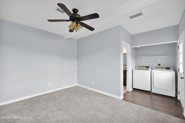 laundry area with ceiling fan, dark colored carpet, and washing machine and clothes dryer