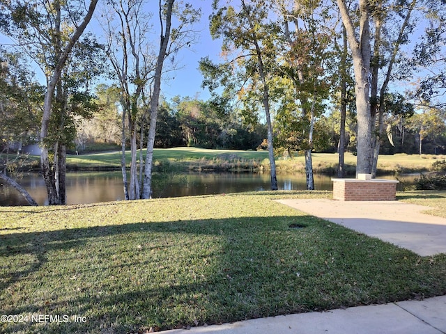 view of yard with a water view