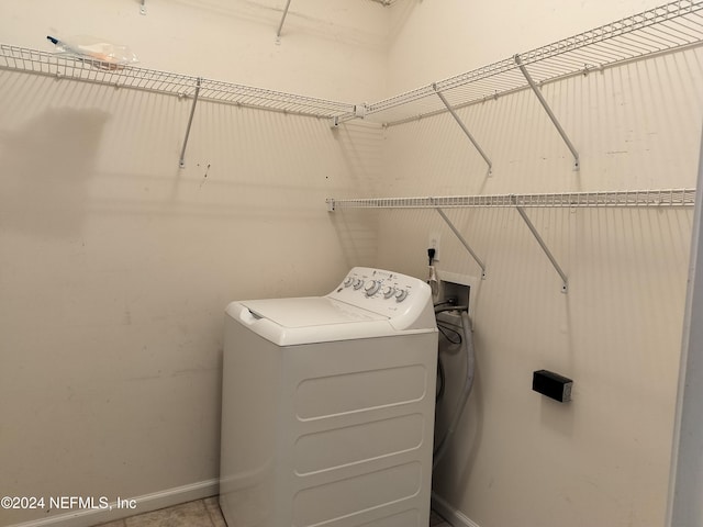 2546 Willow Creek Dr, Fleming Island, FL 32003 - laundry room featuring washer / dryer and baseboards