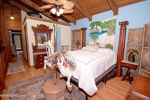 bedroom featuring vaulted ceiling with beams, ceiling fan, wood ceiling, and light wood-type flooring