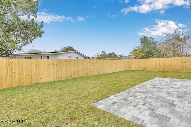 view of yard with a patio area