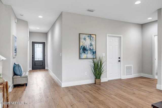 foyer with light wood-type flooring