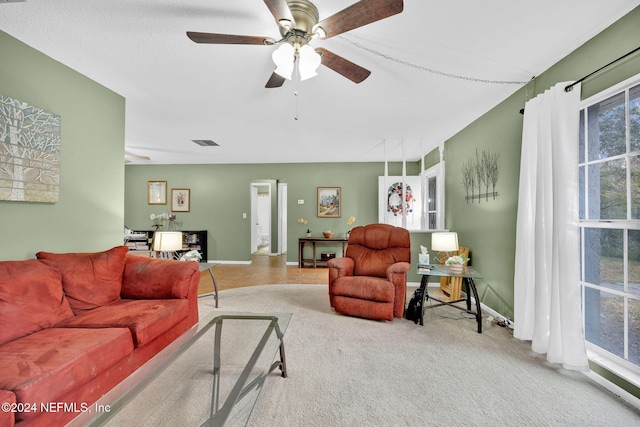 1 Farrington Ln, Palm Coast, FL 32137 - carpeted living area featuring ceiling fan and baseboards