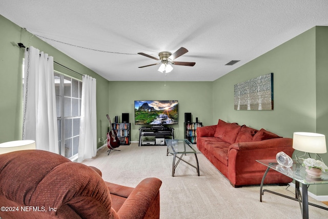 1 Farrington Ln, Palm Coast, FL 32137 - living room with carpet floors, a ceiling fan, and a textured ceiling