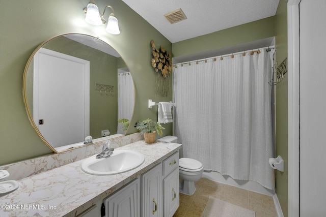 full bathroom with vanity, shower / bath combination with curtain, toilet, and a textured ceiling