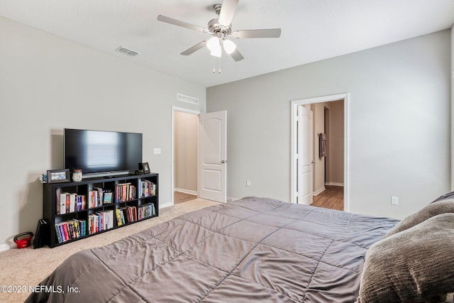 carpeted bedroom with ceiling fan