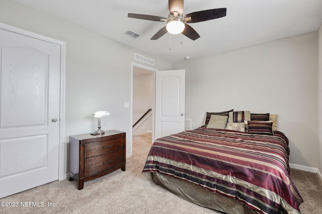 carpeted bedroom featuring ceiling fan