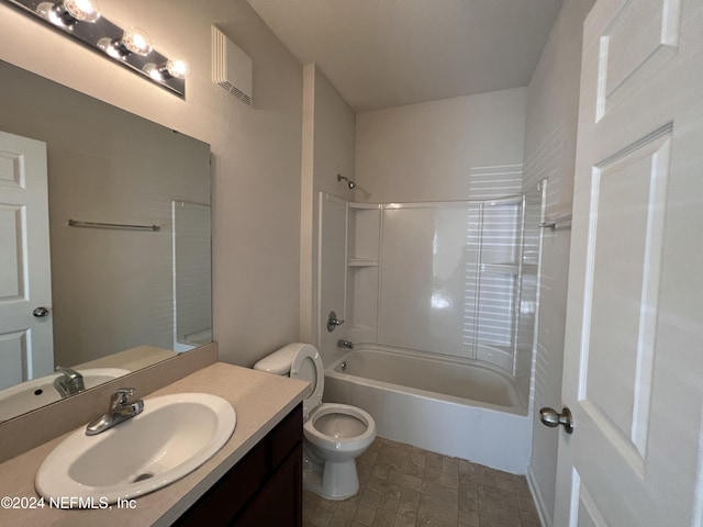 full bathroom with vanity,  shower combination, and toilet