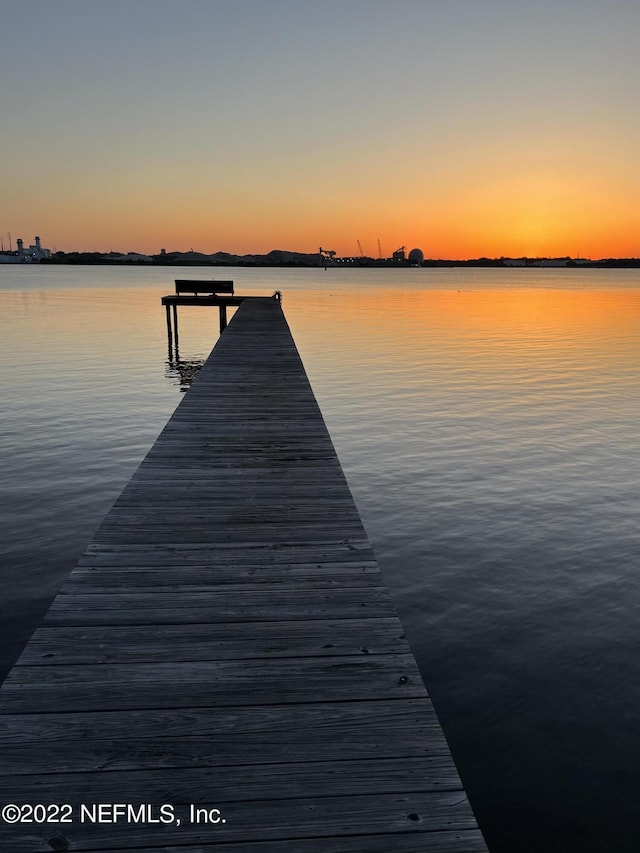 view of dock with a water view