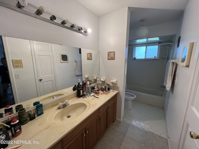 full bathroom with vanity, washtub / shower combination, tile patterned flooring, toilet, and a textured ceiling