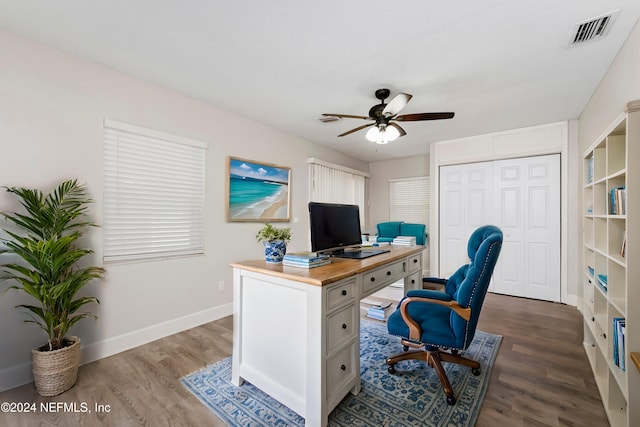 office area with hardwood / wood-style flooring and ceiling fan