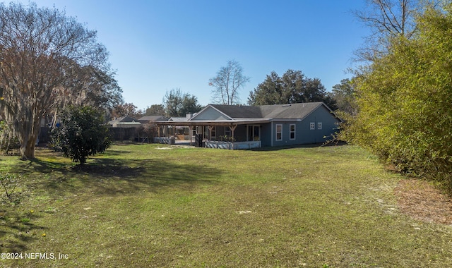 exterior space with a yard