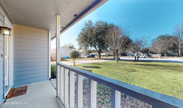 balcony featuring covered porch