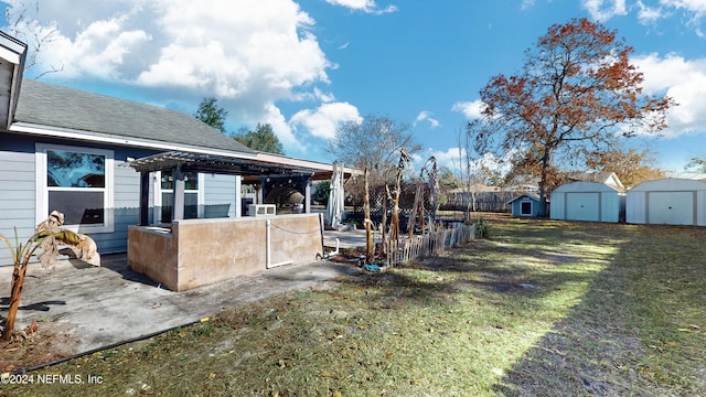 view of yard with a pergola and a storage unit