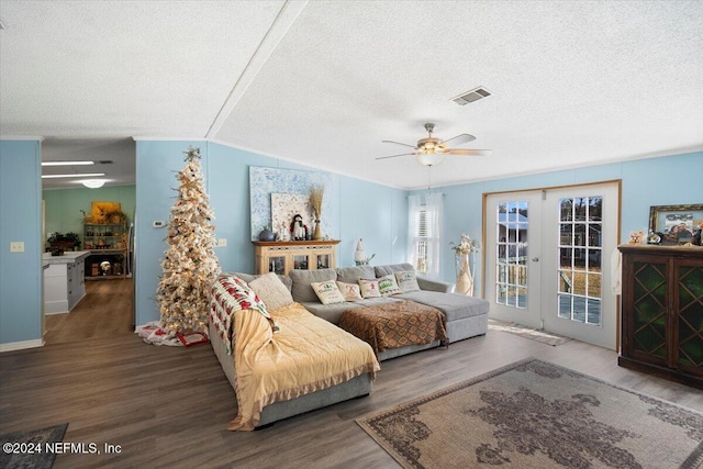 bedroom with french doors, a textured ceiling, access to outside, ceiling fan, and hardwood / wood-style floors