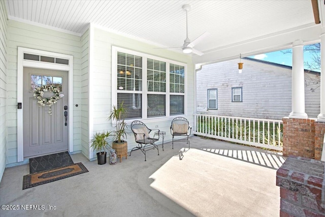 exterior space with a porch and ceiling fan