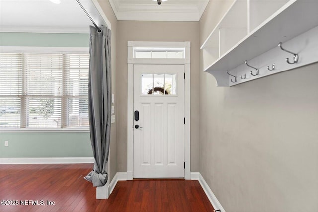 doorway to outside featuring a wealth of natural light, dark hardwood / wood-style flooring, and crown molding