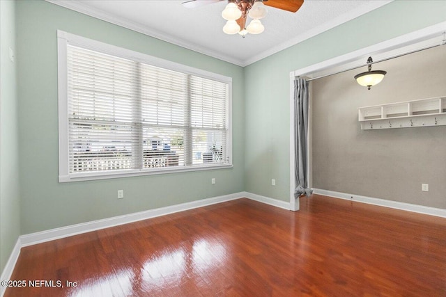 spare room with wood-type flooring, a textured ceiling, ceiling fan, and crown molding