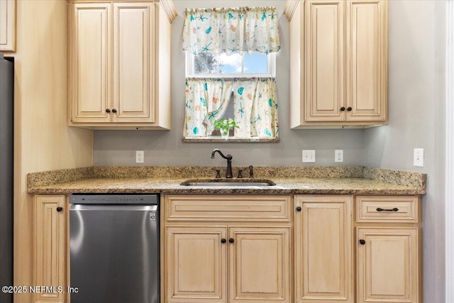 kitchen with stainless steel dishwasher, light brown cabinets, light stone countertops, and sink