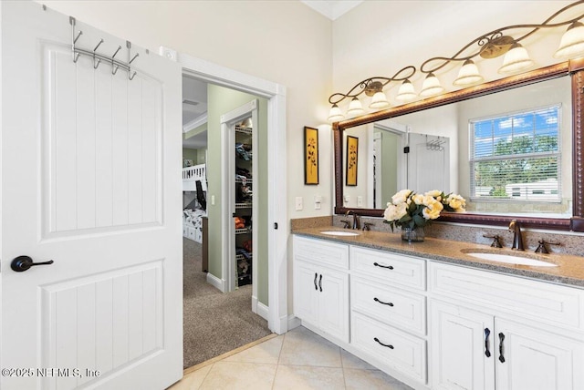 bathroom with vanity and tile patterned floors