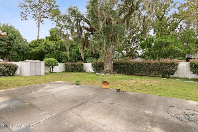 view of patio featuring a storage unit