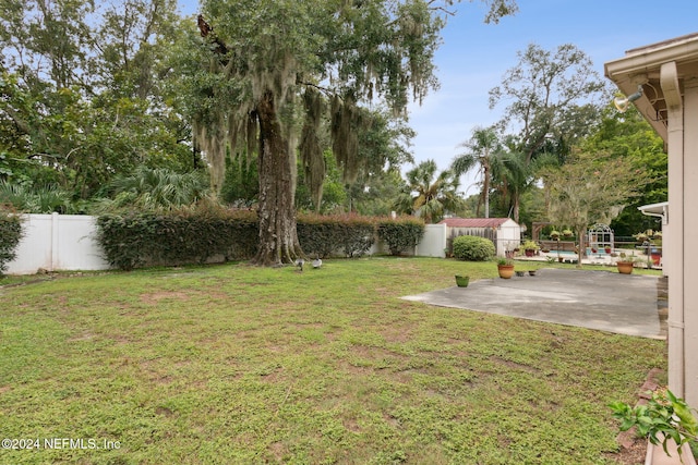 view of yard with a patio area