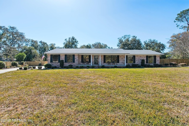 single story home with a front yard