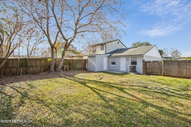 view of yard with central AC