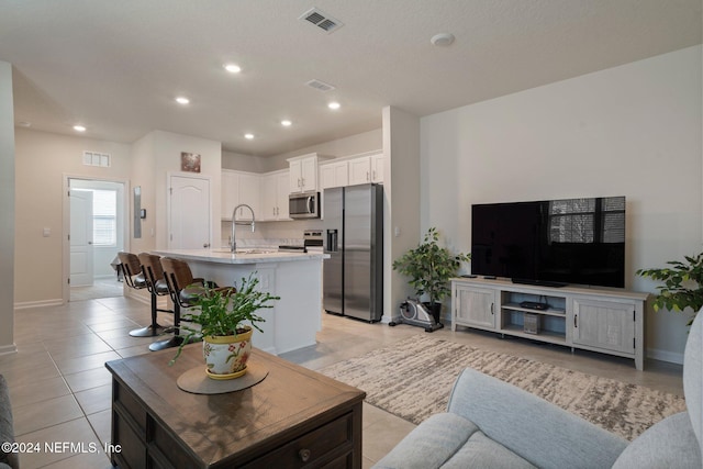 tiled living room with sink