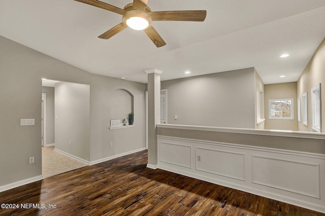 spare room with ceiling fan and hardwood / wood-style floors