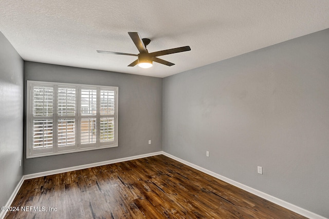 unfurnished room with dark hardwood / wood-style floors, ceiling fan, and a textured ceiling