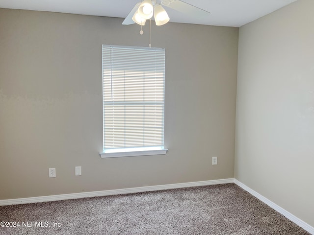 carpeted empty room with ceiling fan