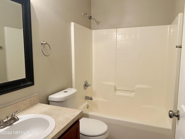 full bathroom featuring vanity, toilet, and shower / washtub combination