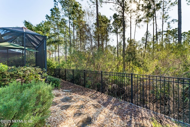 view of yard featuring a lanai