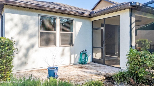 property entrance with a patio