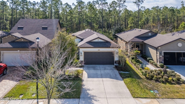 view of front of property with a garage