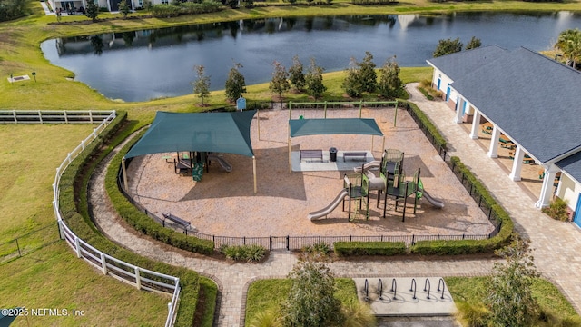 drone / aerial view featuring a water view